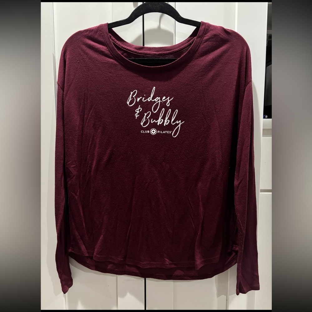 Club Pilates Long Sleeve Top – “Bridges & Bubbly” Graphic – Size Small